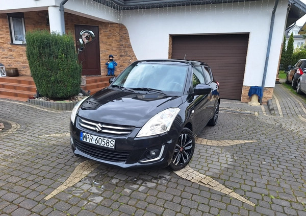 Suzuki Swift cena 34700 przebieg: 100200, rok produkcji 2015 z Żychlin małe 326